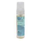 Bottle of pet grooming product with a blue label on a white background