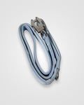 Light blue dog leash with a metal clip on a light gray background