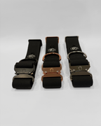 Three dog collars with buckles on a white background