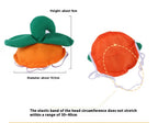 A pumpkin-shaped soft toy or costume accessory shown from two angles on a white background, with text indicating height about 9 cm, diameter about 10.5 cm, and a note about the elastic head band not stretching beyond 30-40 cm.