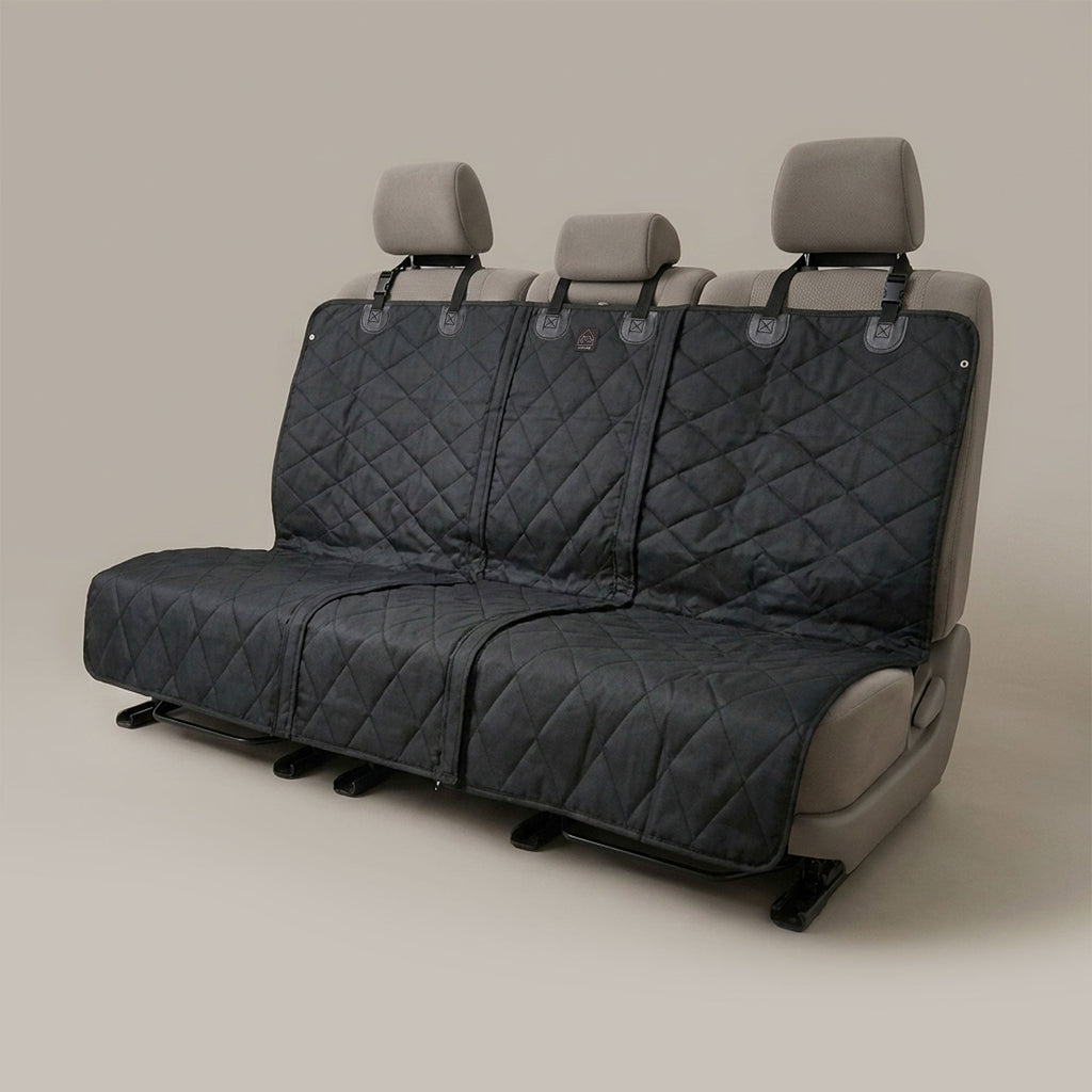 Car seat cover with diamond pattern on a beige background