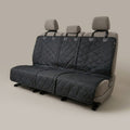Car seat cover with diamond pattern on a beige background