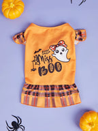 Halloween-themed pet outfit with ghost design and text on a purple background