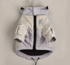 Dog jacket with a visible brand logo on a plain background
