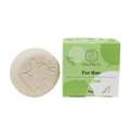 Pet fur bar and its packaging on a white background