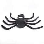 Black spider-shaped pet halloween costume on a white background