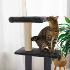 Cat climbing a gray cat tree with a plant in the background