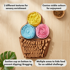 Dog toy with different textures and colors on a wooden surface