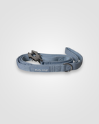 Blue dog leash with a metal clip on a white background