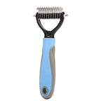 Pet grooming tool with blue handle and metal teeth on a white background