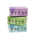 Three stacked boxes with purple, green, and blue lids on a white background