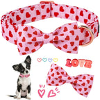 Dog collar with red heart pattern and bow tie, accompanied by a small dog, on a white background.