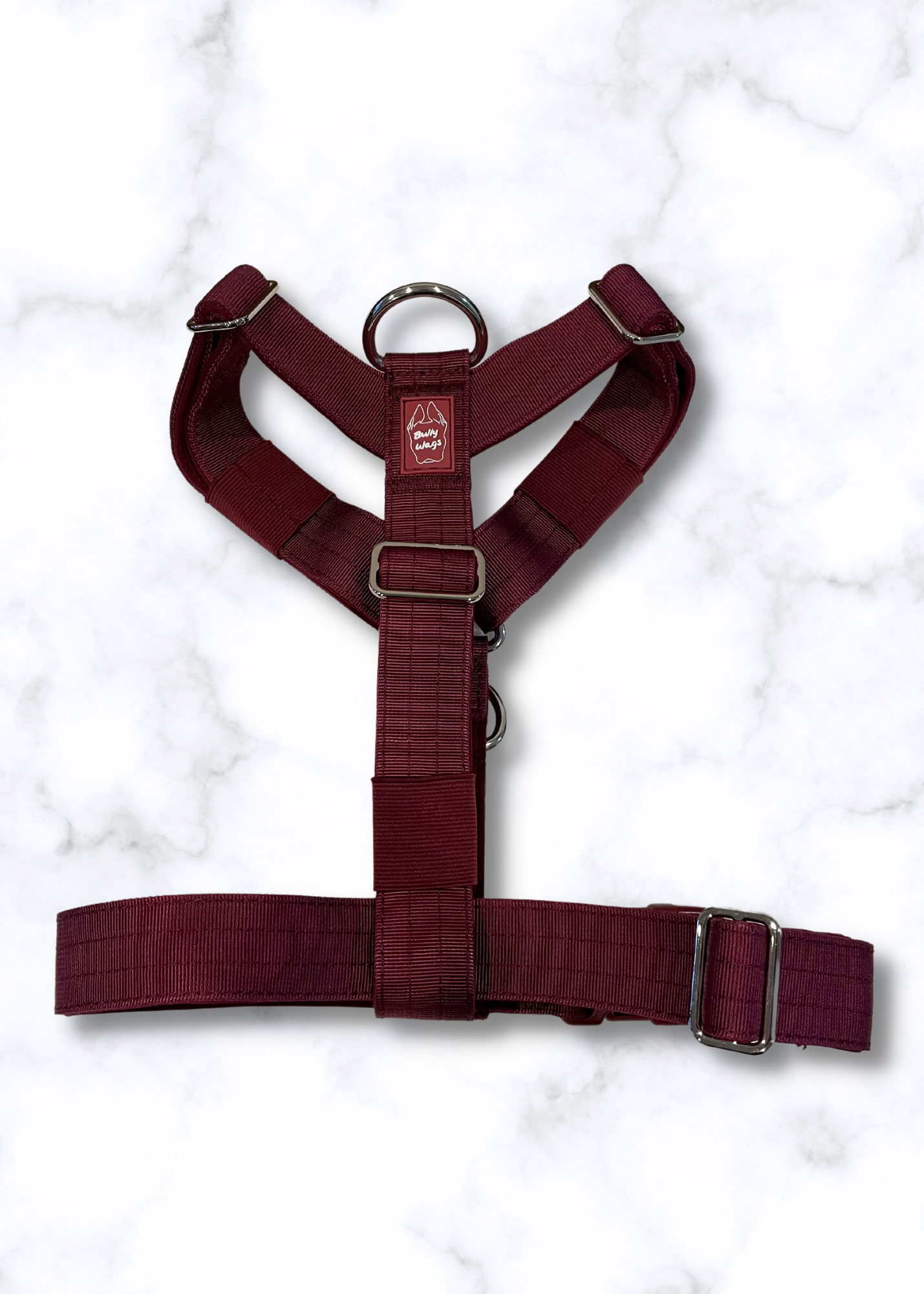 Cherry Wine dog harness on a white marble background