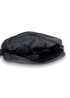 Black treat pouch with zipper on a white background