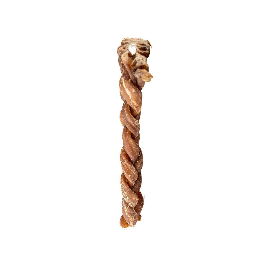 Braided dried lamb gullet on a white background