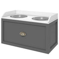 Gray pet feeding station with white top and two bowls.