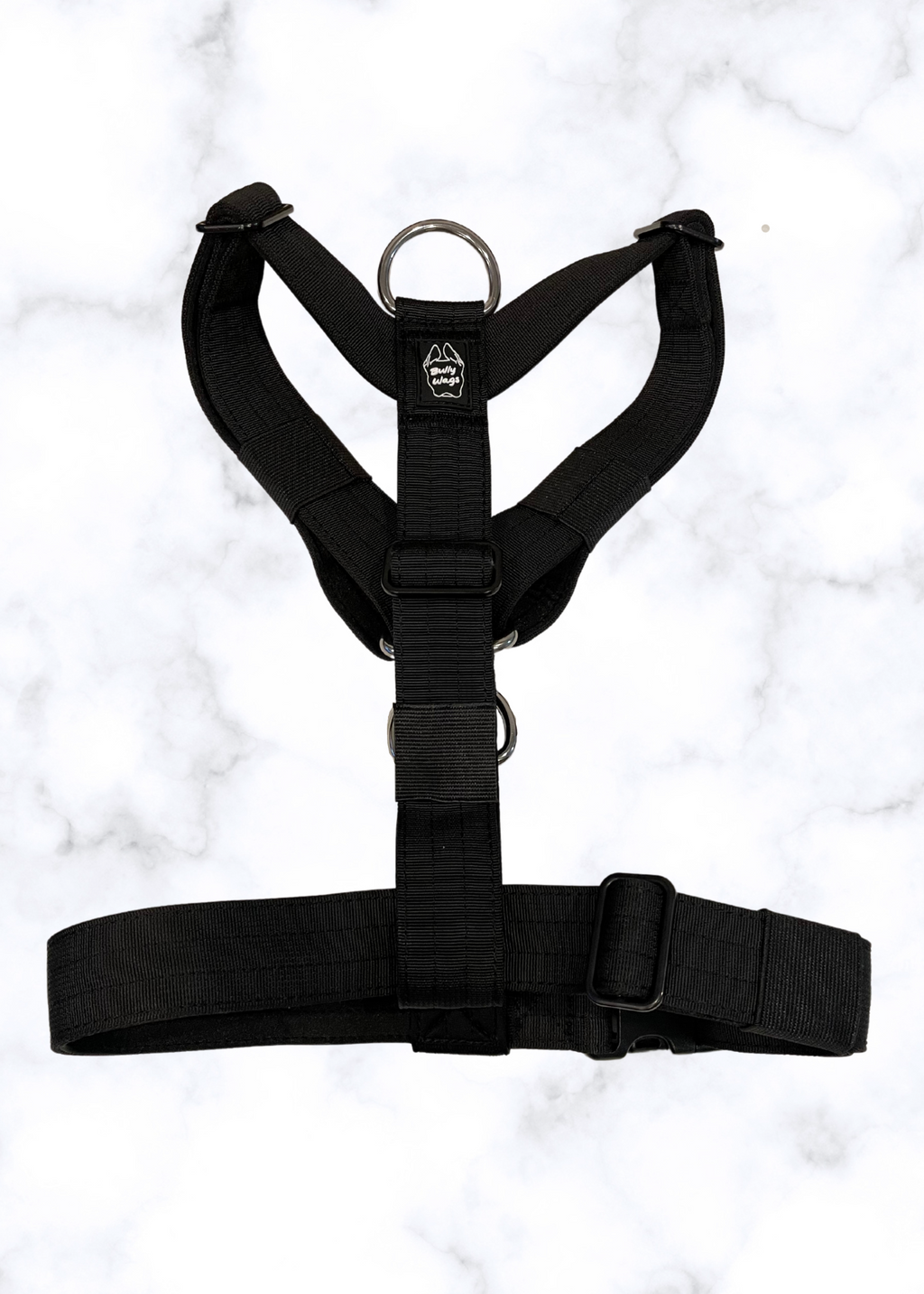 Black dog harness on a light gray background