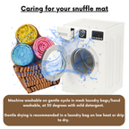 Washing machine with colorful snuffle mats and washing instructions on a white background