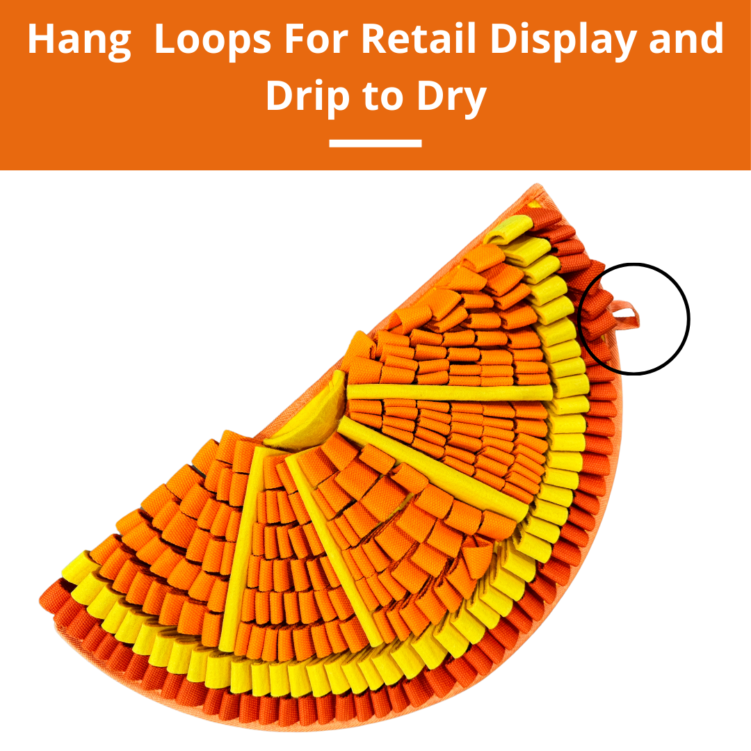 Colorful fabric item with a hang loop for retail display and drip to dry on an orange background.