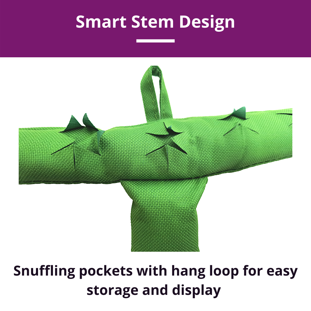 Green product with snuffling pockets and hang loop on a white background