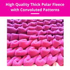 Close-up of pink thick polar fleece fabric with patterns on a white background.