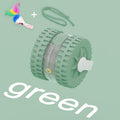Green pet toy with colorful feather on a light green background