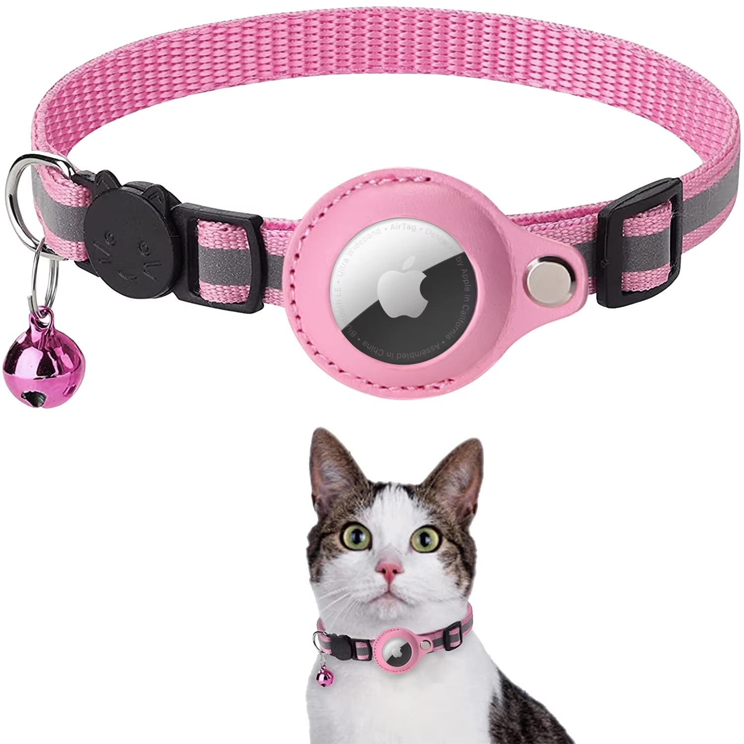 Pink and gray pet collar with a bell and a small round device, worn by a cat.