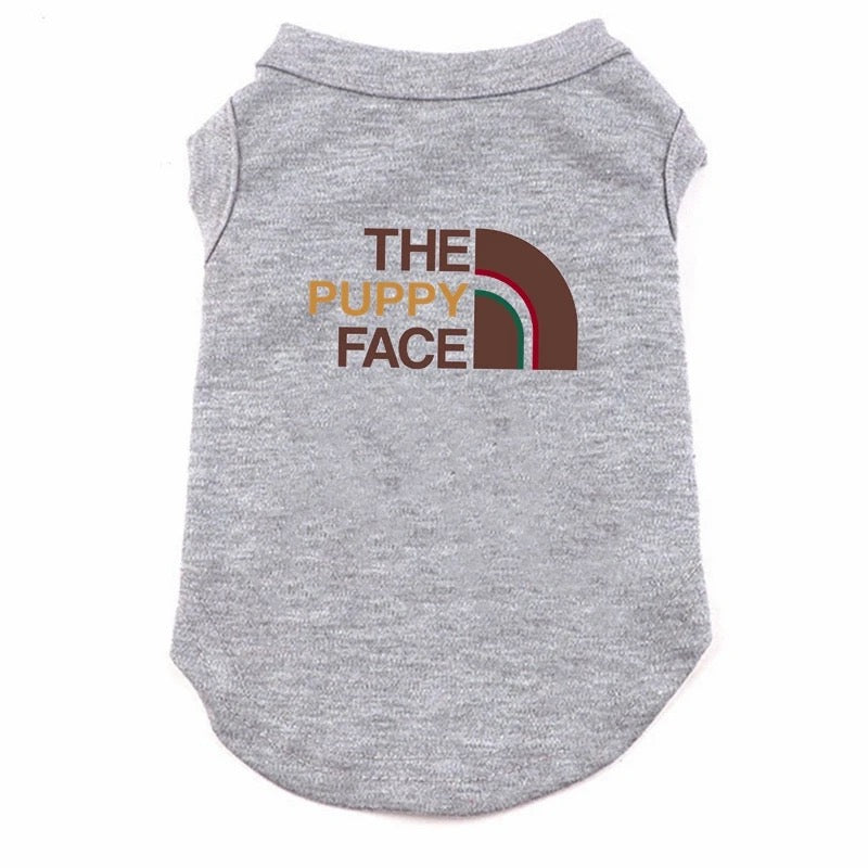 Gray pet shirt with 'The Puppy Face' text and logo on a white background