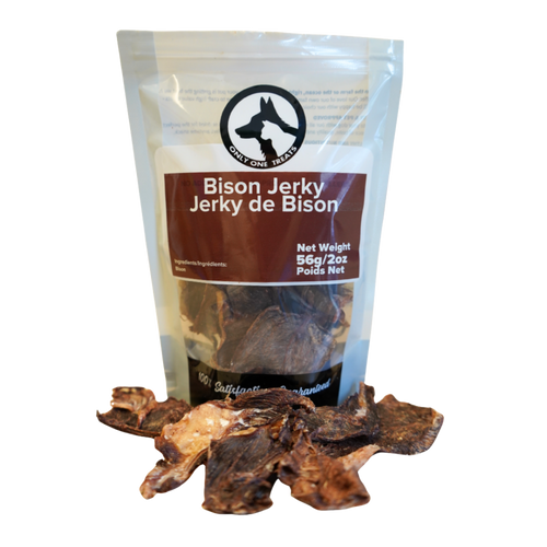 Package of bison jerky with visible jerky pieces on a white background