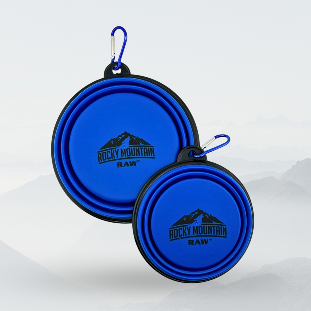 Two blue collapsible dog bowls with Rocky Mountain Raw logo on a white background