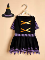 Halloween-themed dress with purple and yellow accents on a beige background