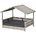Rattan outdoor pet furniture set with canopy and cushion on a white background