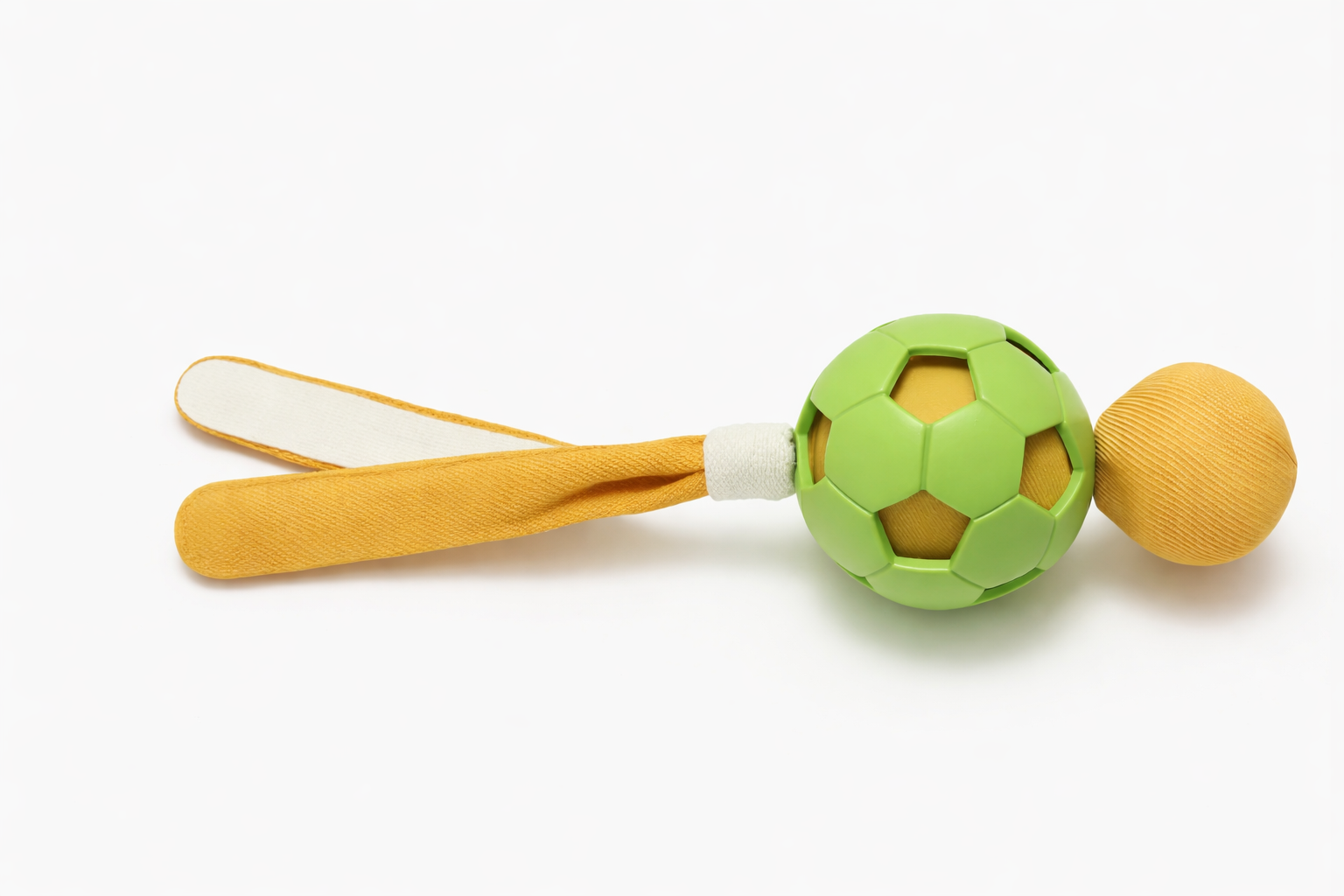 Toy rattle with green ball and yellow handle on a white background