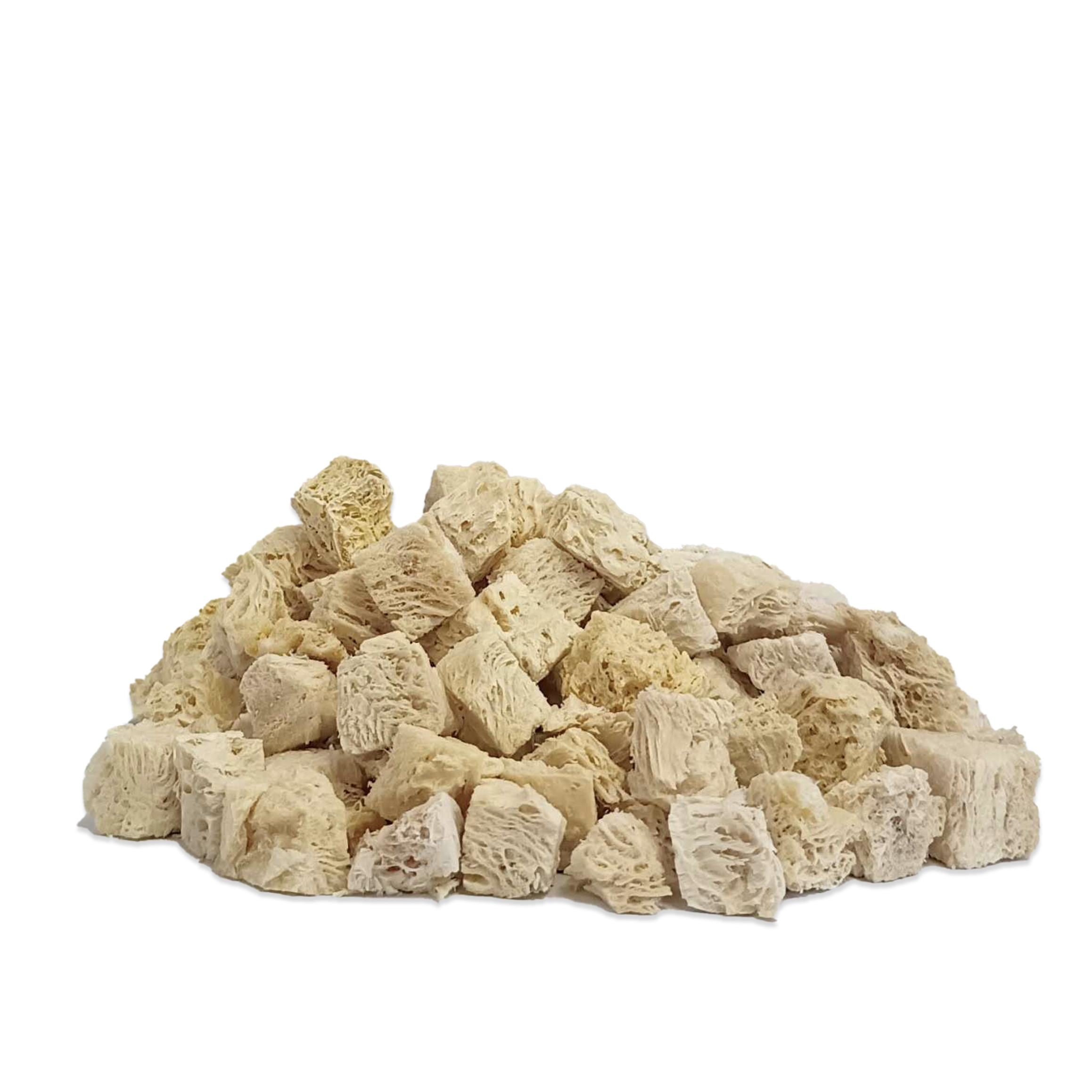 A pile of dog treats on a solid white background.