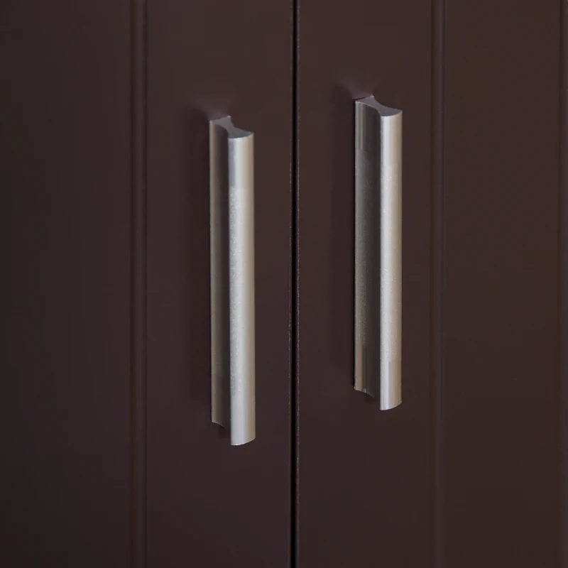 Close-up of two metallic cabinet handles on a dark brown door.