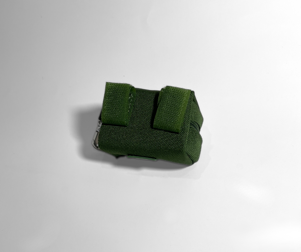 Green fabric strap on a white background