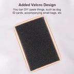 Black rectangular object with added velcro design on a white background