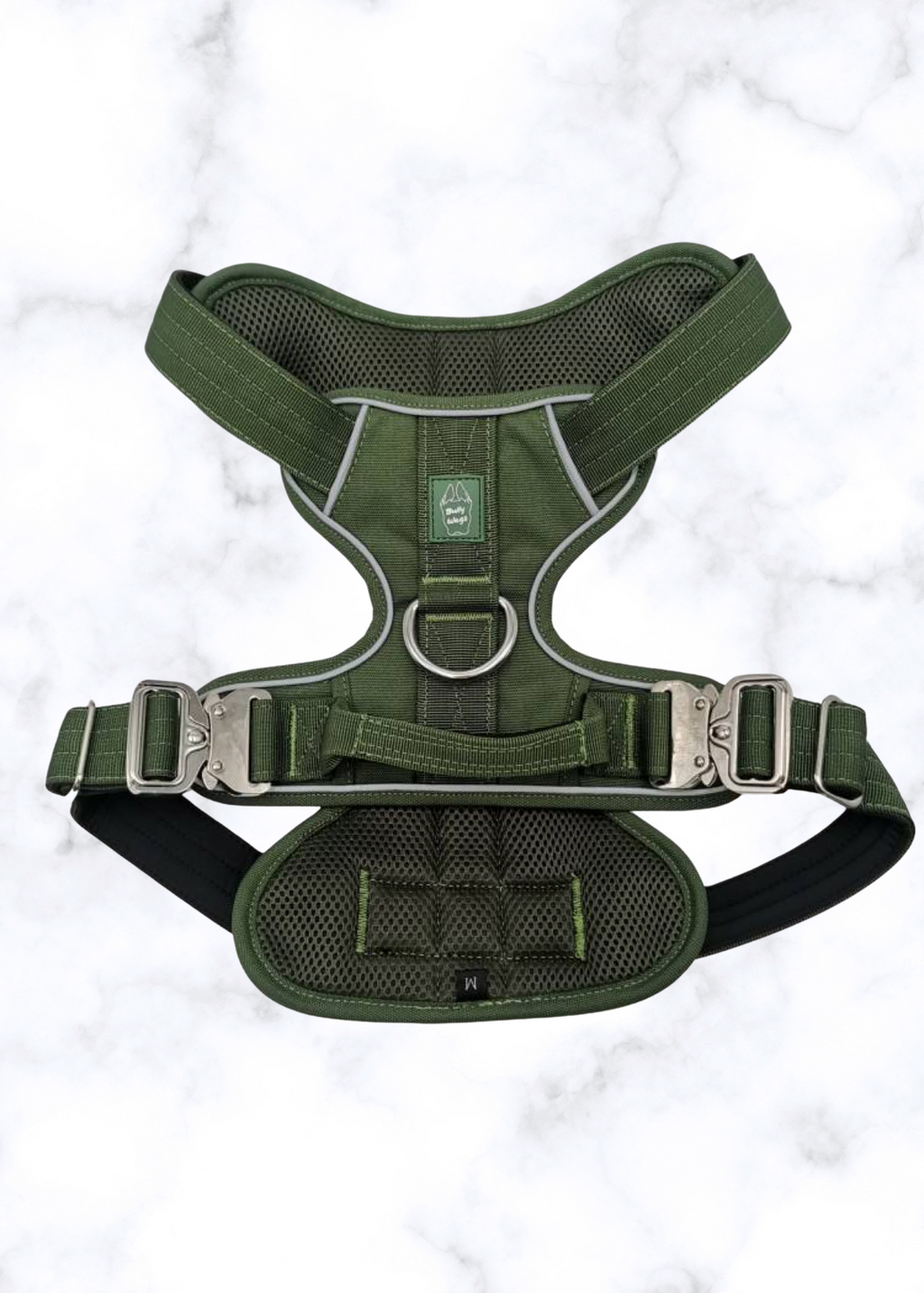 Green dog harness on a white background