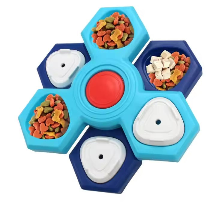 Blue and red dog puzzle toy with compartments filled with dog treats on a white background