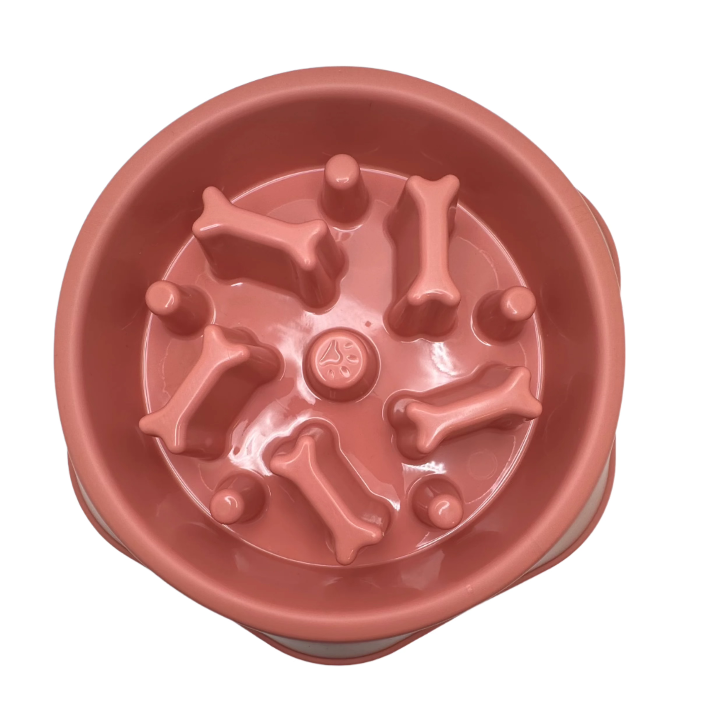 Pink dog food bowl with bone-shaped protrusions on a white background