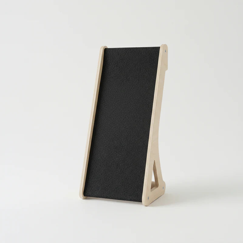 Black felt cat scratcher on a white background