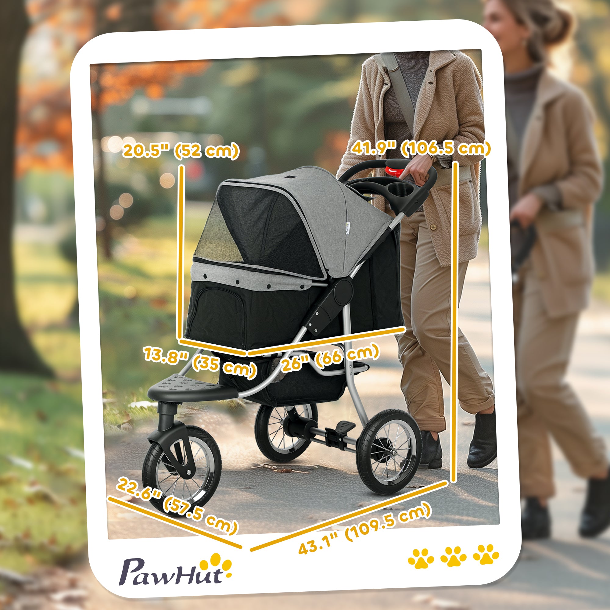 Gray stroller with measurements and a blurred background of people walking.