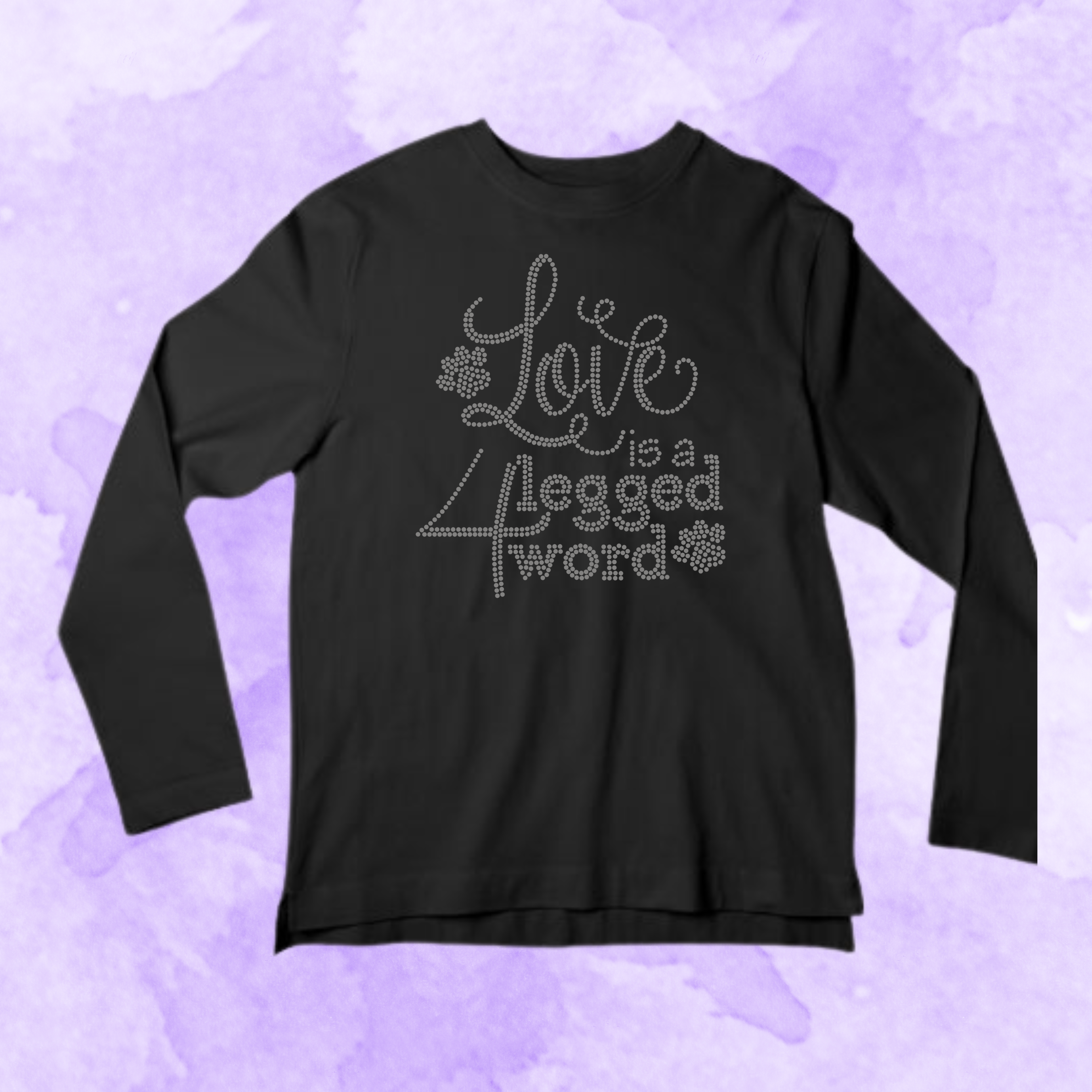 Black long-sleeve shirt with 'Love is a flegged word' text on a purple patterned background