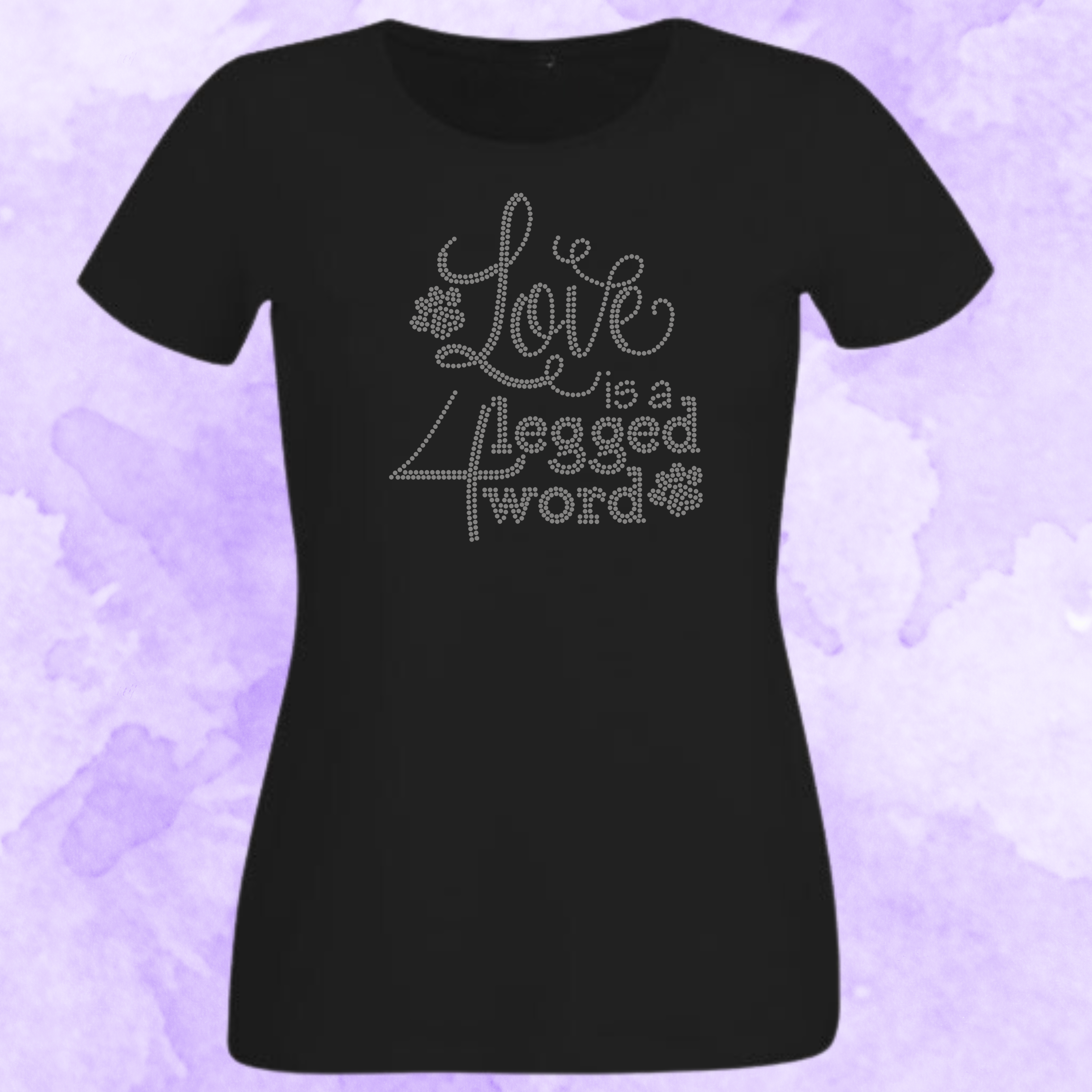 Black t-shirt with 'Love is a 4-Legged Word' text on a purple floral background