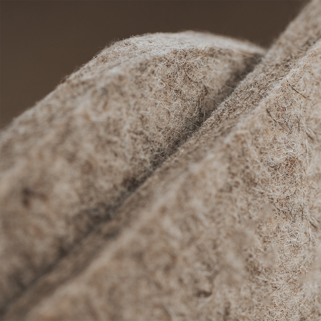 Close-up of a textured felt 
surface