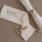 Roll of paper with 'MATT' branding on a textured surface