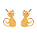Gold cat-shaped earrings on a white background