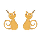 Gold cat-shaped earrings on a white background