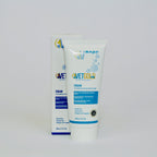 Tube of cream with packaging on a gray background