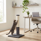Cat climbing a scratching post in a home office setting with a desk and chair.